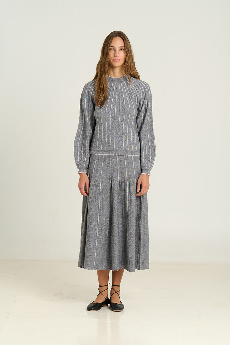 Sweater With Radial Structure